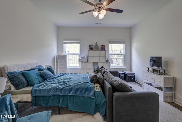 5402 Wildlife Cir, Piney Flats, TN 37686 - bedroom with multiple windows and a ceiling fan