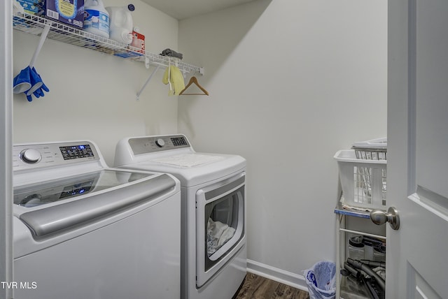 5402 Wildlife Cir, Piney Flats, TN 37686 - laundry room featuring separate washer and dryer and dark wood finished floors