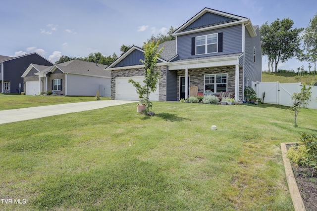 5402 Wildlife Cir, Piney Flats, TN 37686 - craftsman inspired home featuring stone siding, a porch, driveway, an attached garage, and a gate