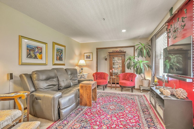 4700 Weaver Pike, Bluff City, TN 37618 - carpeted living room featuring a textured ceiling and recessed lighting