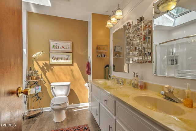 4700 Weaver Pike, Bluff City, TN 37618 - full bathroom featuring wood finished floors, double vanity, and an enclosed shower