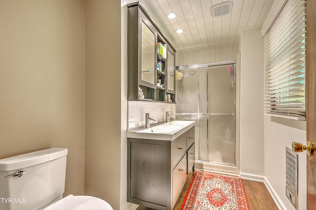 4700 Weaver Pike, Bluff City, TN 37618 - bathroom featuring recessed lighting, vanity, wood finished floors, a shower stall, and backsplash