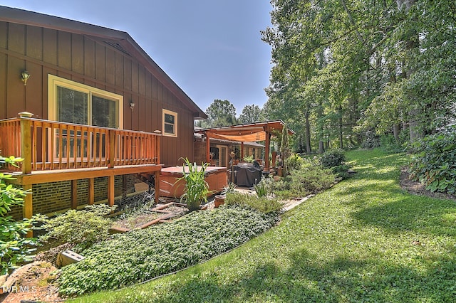 4700 Weaver Pike, Bluff City, TN 37618 - view of green lawn with a hot tub and a wooden deck