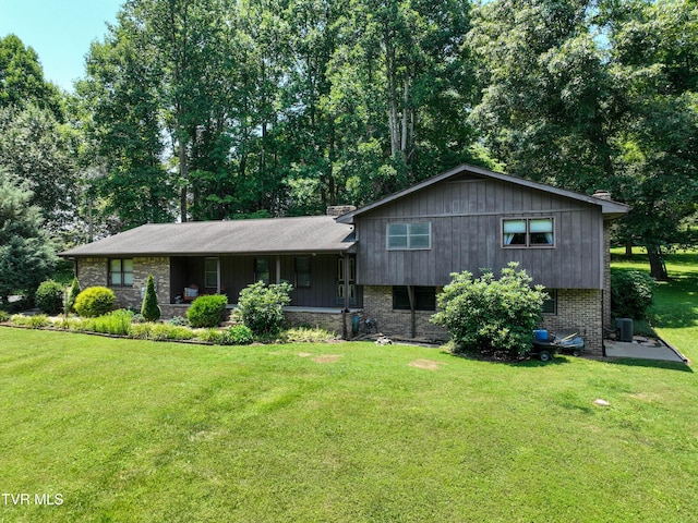 4700 Weaver Pike, Bluff City, TN 37618 - tri-level home with a front lawn, brick siding, and covered porch