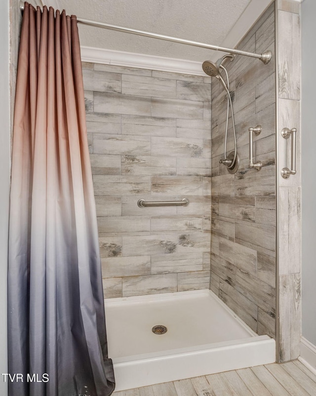 1121 Watauga St, Kingsport, TN 37660 - full bath featuring a shower stall and wood finished floors