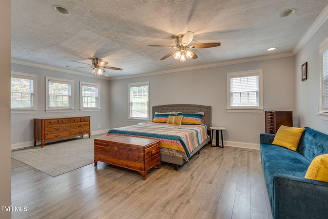 1121 Watauga St, Kingsport, TN 37660 - bedroom featuring light wood-style floors, multiple windows, crown molding, a textured ceiling, and recessed lighting
