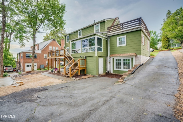 1121 Watauga St, Kingsport, TN 37660 - back of house with stairway and a deck