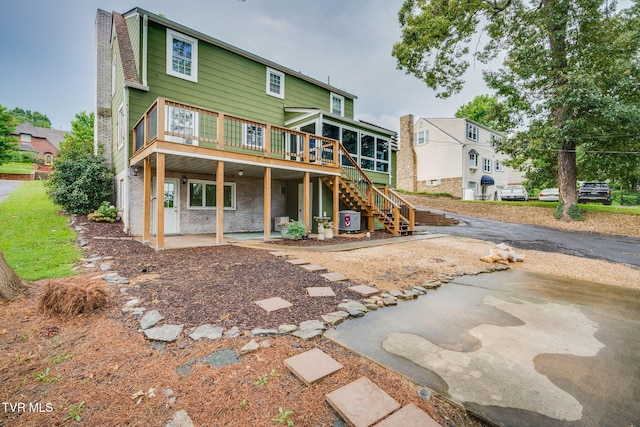 1121 Watauga St, Kingsport, TN 37660 - back of property with stairs, a wooden deck, and a patio area