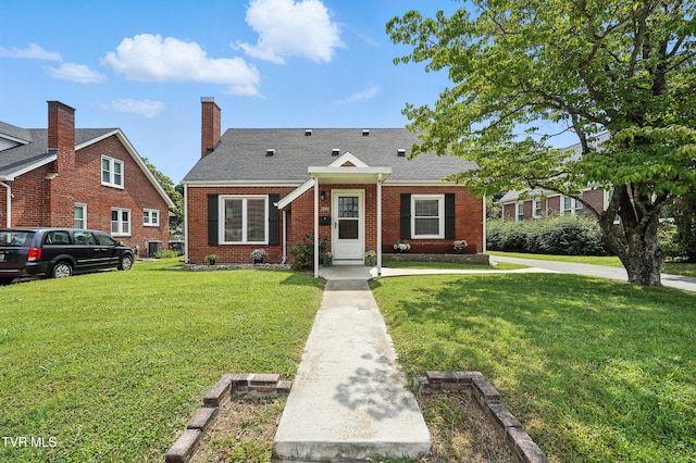 1340 Wateree St, Kingsport, TN 37660 - view of front of house featuring a front lawn and brick siding