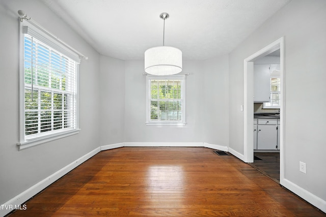1340 Wateree St, Kingsport, TN 37660 - unfurnished dining area with plenty of natural light and wood finished floors