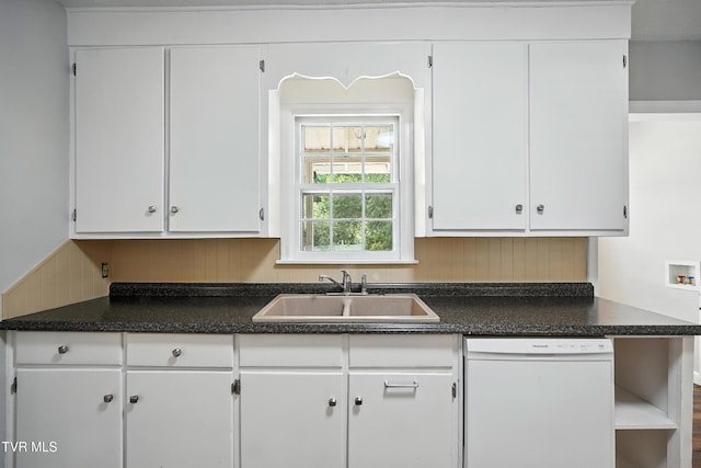 1340 Wateree St, Kingsport, TN 37660 - kitchen with white dishwasher, dark countertops, and white cabinets