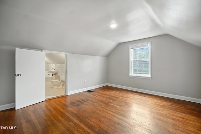 1340 Wateree St, Kingsport, TN 37660 - additional living space with hardwood / wood-style flooring and lofted ceiling