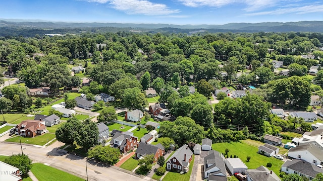 1340 Wateree St, Kingsport, TN 37660 - aerial view of residential area featuring a mountainous background and a forest