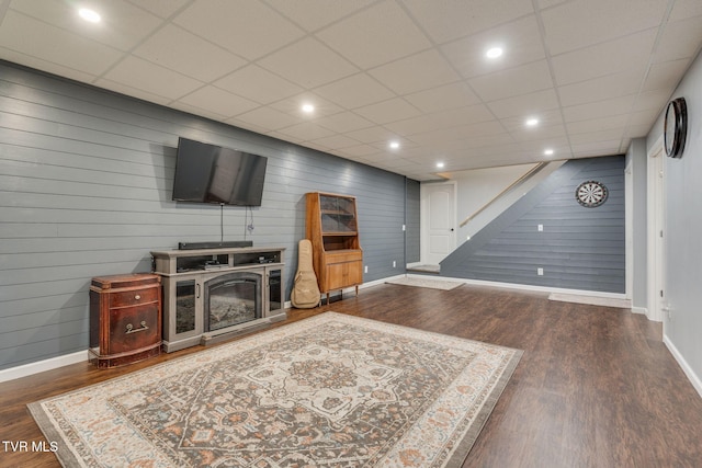 2424 Rivermont Dr, Kingsport, TN 37660 - living room featuring wood finished floors, stairs, a paneled ceiling, wood walls, and recessed lighting