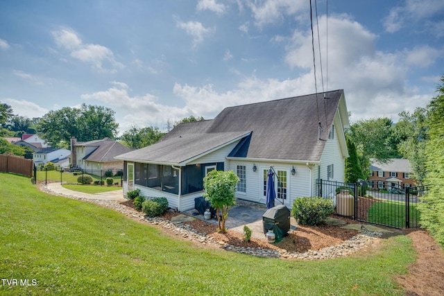 2424 Rivermont Dr, Kingsport, TN 37660 - rear view of house featuring a sunroom, a shingled roof, and a gate
