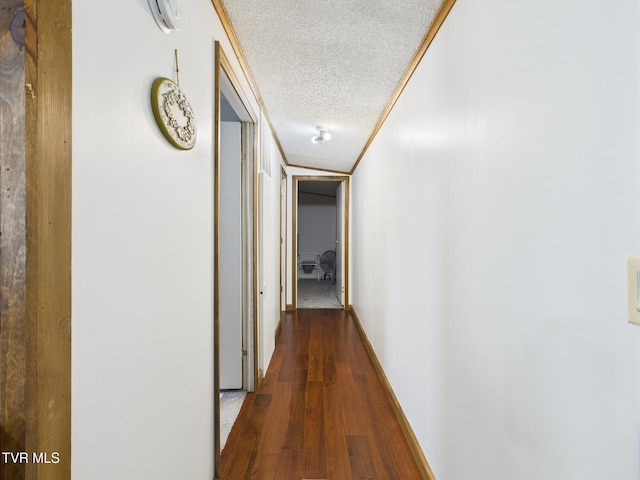 109 Wampler St, Kingsport, TN 37665 - hall with a textured ceiling, dark wood-style floors, and ornamental molding