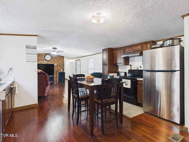 109 Wampler St, Kingsport, TN 37665 - dining room with ceiling fan, dark wood finished floors, a textured ceiling, and lofted ceiling