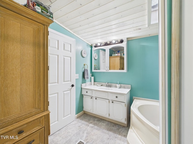 109 Wampler St, Kingsport, TN 37665 - bathroom with vanity, a garden tub, wooden ceiling, and marble look tile flooring