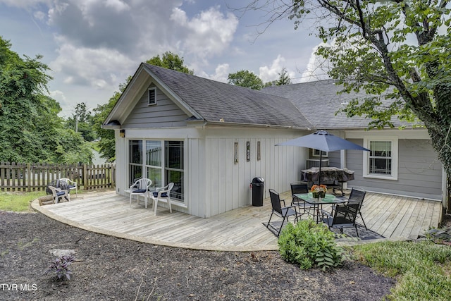 3277 Ashley St, Kingsport, TN 37664 - back of property with outdoor dining space, a deck, roof with shingles, and board and batten siding
