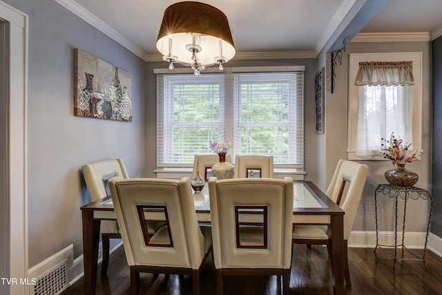 3277 Ashley St, Kingsport, TN 37664 - dining room with a chandelier, crown molding, and wood finished floors
