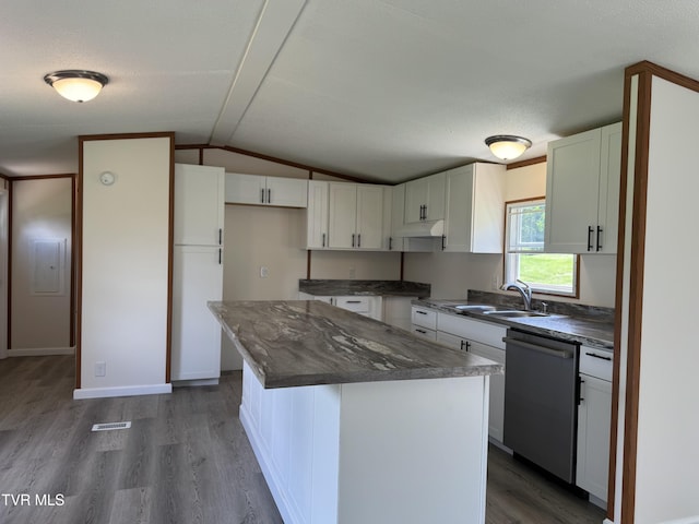 118 Clover, Jonesborough, TN 37659 - kitchen with dishwasher, vaulted ceiling, white cabinetry, wood finished floors, and a center island