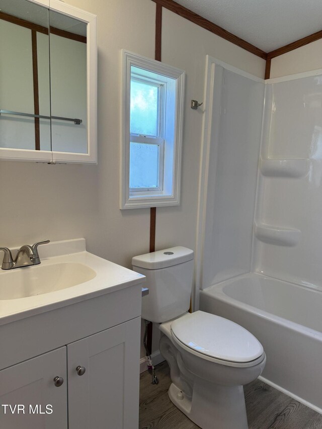 118 Clover, Jonesborough, TN 37659 - full bath featuring vanity, wood finished floors, crown molding, and shower / tub combination
