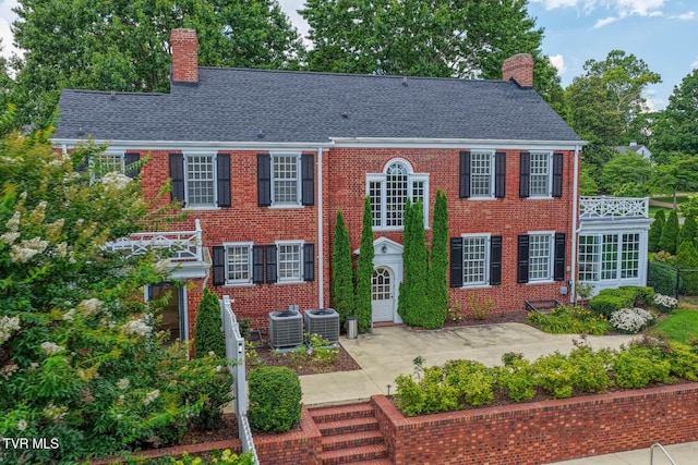 1261 Watauga St, Kingsport, TN 37660 - view of front of property with a chimney, brick siding, and a shingled roof