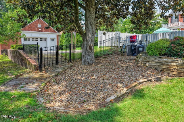 1261 Watauga St, Kingsport, TN 37660 - view of yard featuring an outbuilding and a garage