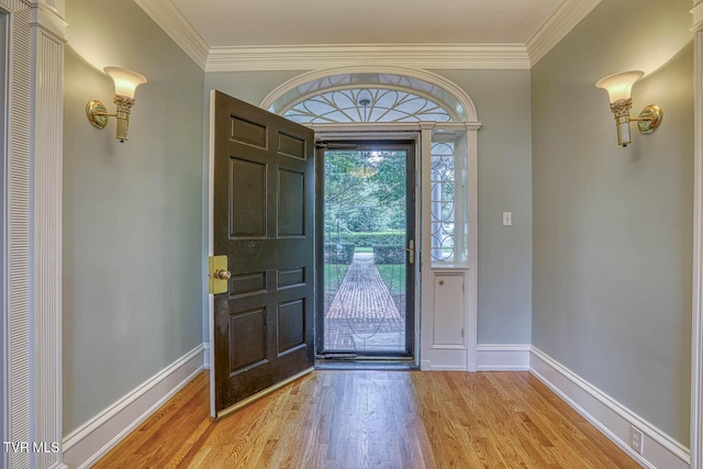 1261 Watauga St, Kingsport, TN 37660 - entryway featuring light wood-type flooring and ornamental molding