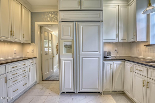 1261 Watauga St, Kingsport, TN 37660 - kitchen with dark stone countertops, paneled built in refrigerator, and ornamental molding