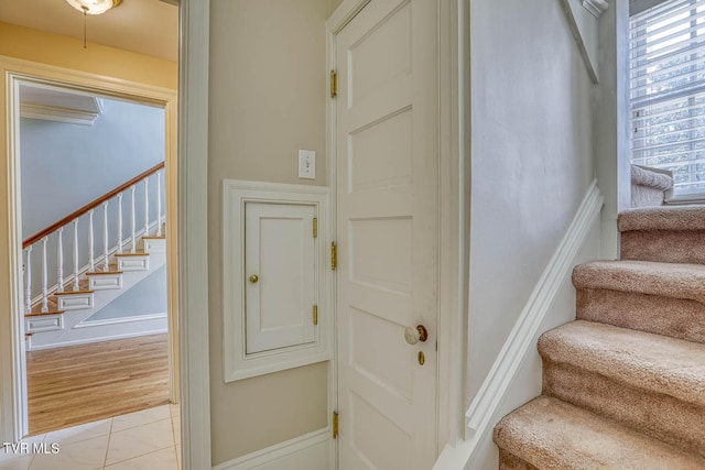 1261 Watauga St, Kingsport, TN 37660 - stairway featuring tile patterned flooring and baseboards
