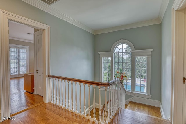 1261 Watauga St, Kingsport, TN 37660 - hallway featuring wood finished floors, an upstairs landing, and ornamental molding