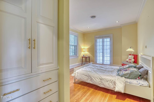 1261 Watauga St, Kingsport, TN 37660 - bedroom featuring light wood-type flooring, crown molding, and recessed lighting