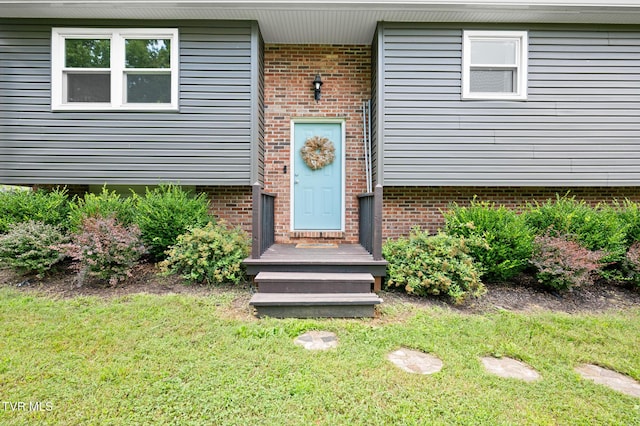 3020 Ridgemont Cir, Kingsport, TN 37663 - view of exterior entry with a lawn and brick siding