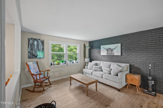 3020 Ridgemont Cir, Kingsport, TN 37663 - living area with wood finished floors and brick wall