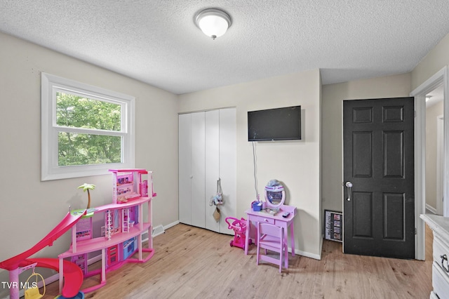 3020 Ridgemont Cir, Kingsport, TN 37663 - game room featuring wood finished floors and a textured ceiling