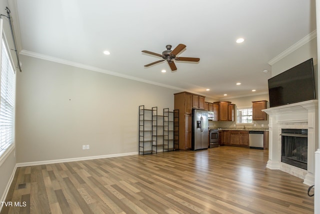 1900 Knob Creek Rd Unit 404, Johnson City, TN 37604 - unfurnished living room with ceiling fan, wood finished floors, crown molding, recessed lighting, and a fireplace
