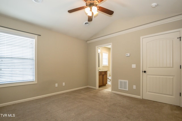 1900 Knob Creek Rd Unit 404, Johnson City, TN 37604 - unfurnished bedroom featuring lofted ceiling, light carpet, connected bathroom, and ceiling fan
