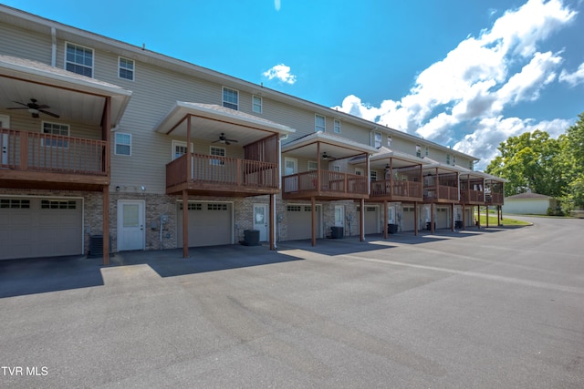 1900 Knob Creek Rd Unit 404, Johnson City, TN 37604 - view of building exterior featuring a garage and driveway