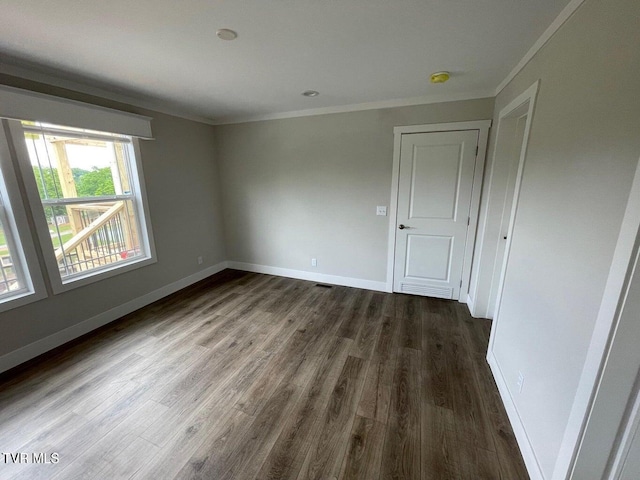 1819 Siesta Dr, Newport, TN 37821 - unfurnished room featuring ornamental molding and dark wood-type flooring