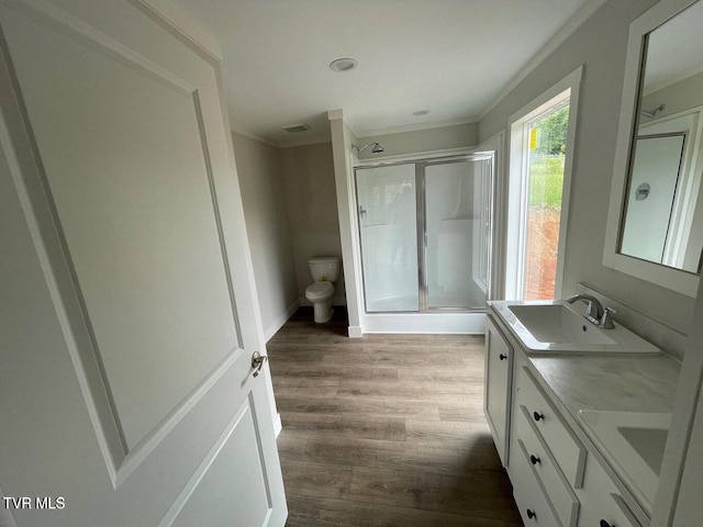 1819 Siesta Dr, Newport, TN 37821 - bathroom with a stall shower, double vanity, wood finished floors, ornamental molding, and recessed lighting