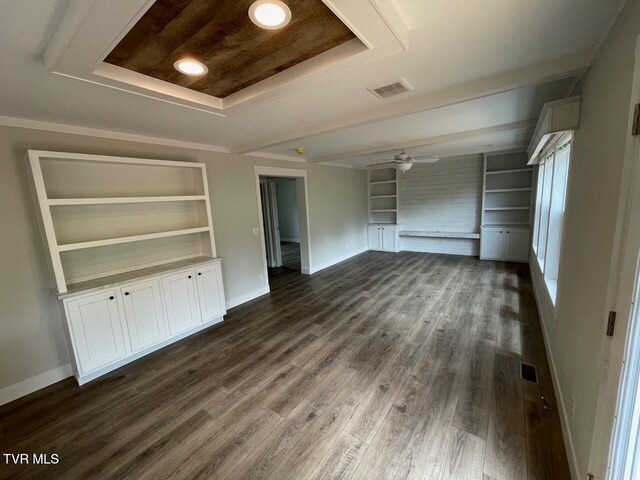 1819 Siesta Dr, Newport, TN 37821 - unfurnished bedroom featuring dark wood-style flooring, a raised ceiling, and a closet