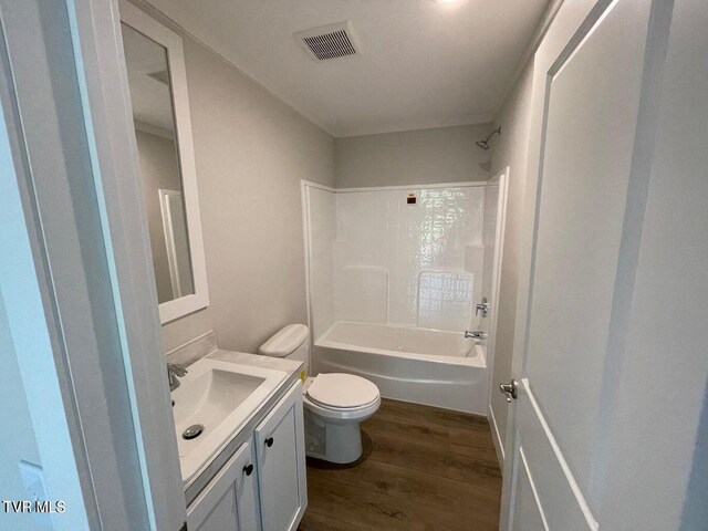 1819 Siesta Dr, Newport, TN 37821 - bathroom with vanity, wood finished floors, and washtub / shower combination