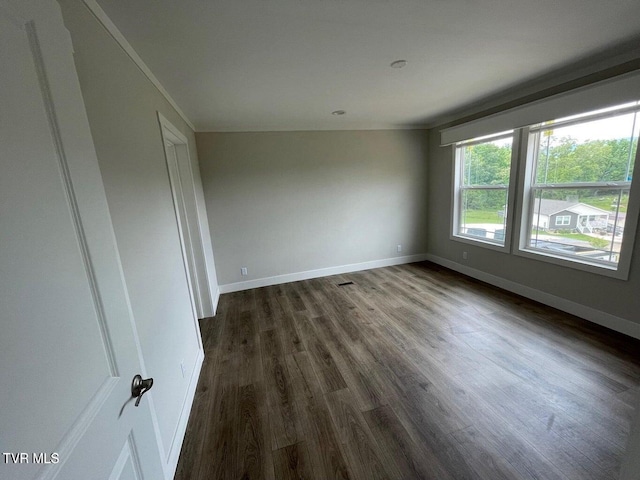 1819 Siesta Dr, Newport, TN 37821 - empty room with dark wood-style floors and ornamental molding