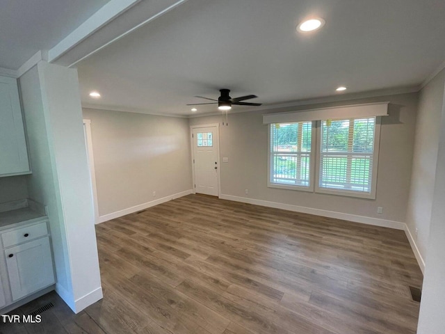 1819 Siesta Dr, Newport, TN 37821 - unfurnished living room with a ceiling fan, dark wood-type flooring, recessed lighting, and crown molding