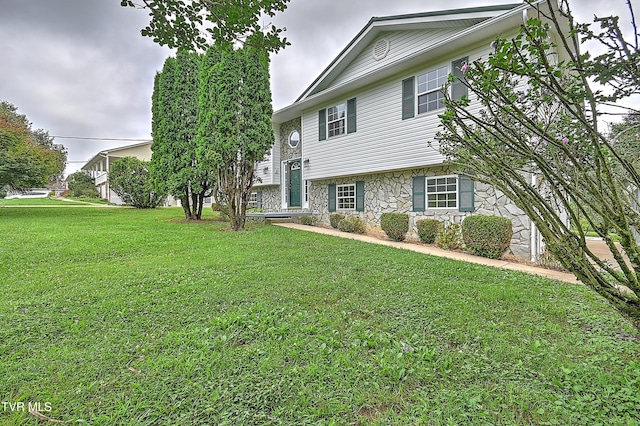 4970 Old Stage Rd, Chuckey, TN 37641 - view of front facade featuring stone siding and a front yard