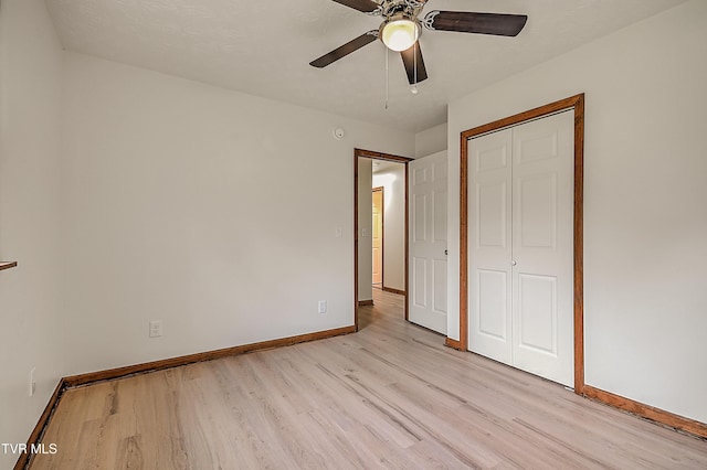 4970 Old Stage Rd, Chuckey, TN 37641 - unfurnished bedroom with light wood-style floors, a closet, and a ceiling fan