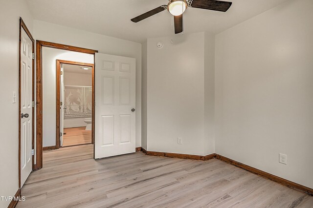 4970 Old Stage Rd, Chuckey, TN 37641 - unfurnished bedroom featuring light wood finished floors and ceiling fan