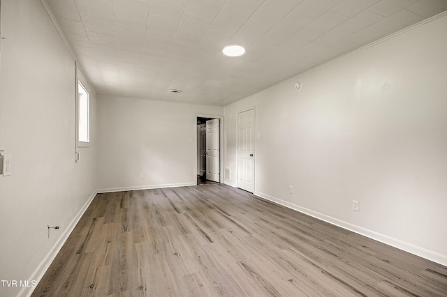 4970 Old Stage Rd, Chuckey, TN 37641 - empty room featuring wood finished floors and ornamental molding