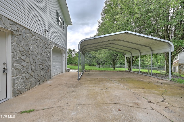 4970 Old Stage Rd, Chuckey, TN 37641 - view of car parking with concrete driveway, a garage, and a carport